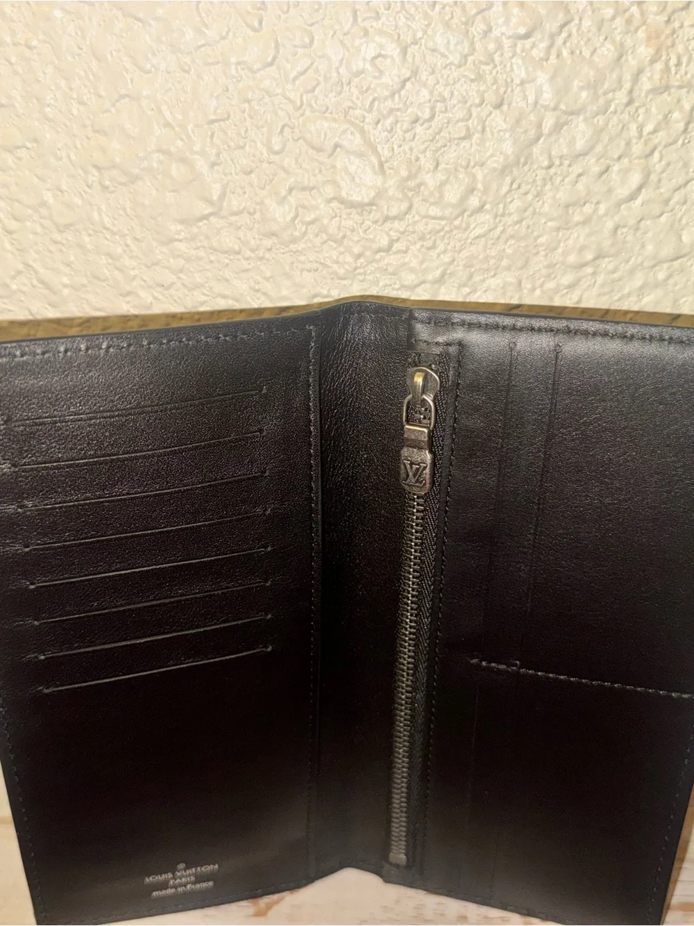 Authentic Louis Vuitton Men's Brown Tiaga Leather Wallet - Classic Slim Design